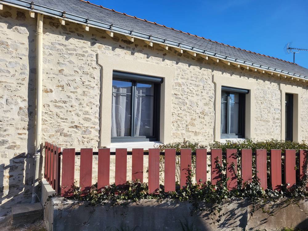 maison renovation barriere rouge